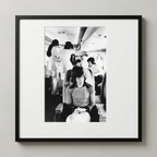 Mick Jagger On Tour Plane (1972) — Jim Marshall — Framed Print