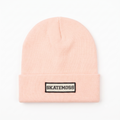 SkateMoss Signage Knit Beanie – Pastel Pink Cuffed Winter Cap with Monochrome Logo Patch