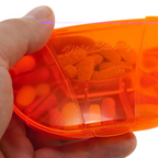 VitaCarry Weekly 7-Day Pill Organizer – Translucent Orange Daily Pill Planner